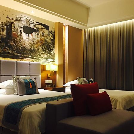 Wu XI Shan Se Hotel Qingyang  Exterior photo