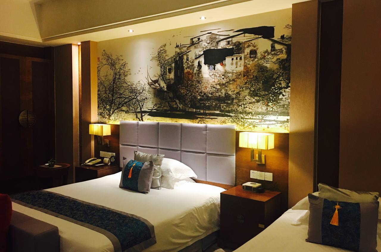 Wu XI Shan Se Hotel Qingyang  Exterior photo
